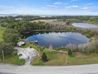Wake up to breathtaking golf course views and embrace the active on Zellwood Station Country Club in Florida - for sale on GolfHomes.com, golf home, golf lot