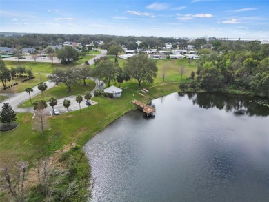 Wake up to breathtaking golf course views and embrace the active on Zellwood Station Country Club in Florida - for sale on GolfHomes.com, golf home, golf lot