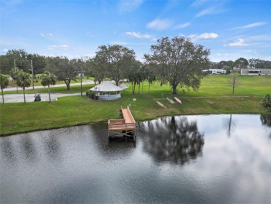 Wake up to breathtaking golf course views and embrace the active on Zellwood Station Country Club in Florida - for sale on GolfHomes.com, golf home, golf lot