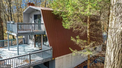 Discover the perfect blend of rustic charm and modern luxury in on Alpine Lake Resort in West Virginia - for sale on GolfHomes.com, golf home, golf lot