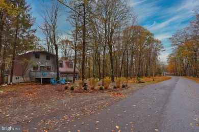 Discover the perfect blend of rustic charm and modern luxury in on Alpine Lake Resort in West Virginia - for sale on GolfHomes.com, golf home, golf lot