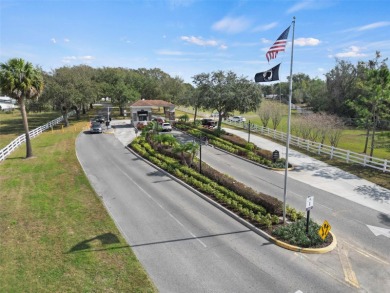 Wake up to breathtaking golf course views and embrace the active on Zellwood Station Country Club in Florida - for sale on GolfHomes.com, golf home, golf lot