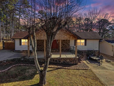 Welcome to 313 Snead Dr. in Fairfield Bay, perfectly positioned on Indian Hills Country Club in Arkansas - for sale on GolfHomes.com, golf home, golf lot