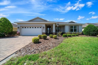 Welcome to this well-maintained 3 bedroom, 2 bath home nestled on Candler Hills Golf and Country Club in Florida - for sale on GolfHomes.com, golf home, golf lot