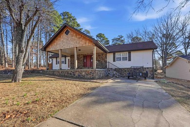 Welcome to 313 Snead Dr. in Fairfield Bay, perfectly positioned on Indian Hills Country Club in Arkansas - for sale on GolfHomes.com, golf home, golf lot