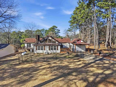 Welcome to 313 Snead Dr. in Fairfield Bay, perfectly positioned on Indian Hills Country Club in Arkansas - for sale on GolfHomes.com, golf home, golf lot