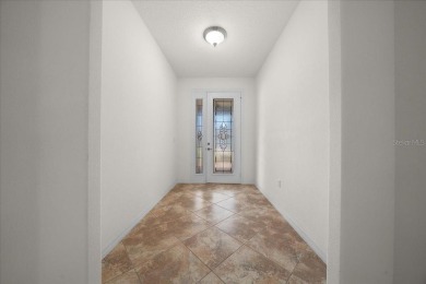 Welcome to this well-maintained 3 bedroom, 2 bath home nestled on Candler Hills Golf and Country Club in Florida - for sale on GolfHomes.com, golf home, golf lot