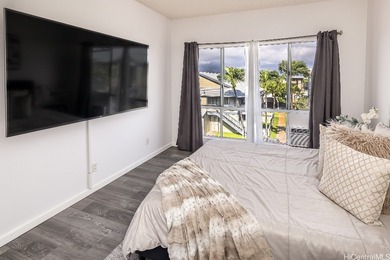 This modern, open-concept residence at Sunrise offers a sleek on Ewa Villages Golf Course in Hawaii - for sale on GolfHomes.com, golf home, golf lot