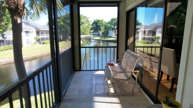 A 2nd floor experience offering stunning water views, great room on Boca West Golf and Country Club in Florida - for sale on GolfHomes.com, golf home, golf lot