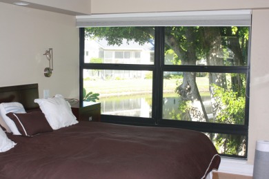 A 2nd floor experience offering stunning water views, great room on Boca West Golf and Country Club in Florida - for sale on GolfHomes.com, golf home, golf lot