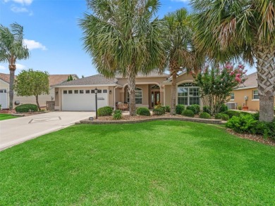 This Custom expanded Gardenia Model has pictuesqes views through on Glenview Championship Golf and Country Club in Florida - for sale on GolfHomes.com, golf home, golf lot