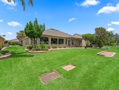 This Custom expanded Gardenia Model has pictuesqes views through on Glenview Championship Golf and Country Club in Florida - for sale on GolfHomes.com, golf home, golf lot