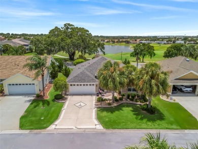 This Custom expanded Gardenia Model has pictuesqes views through on Glenview Championship Golf and Country Club in Florida - for sale on GolfHomes.com, golf home, golf lot