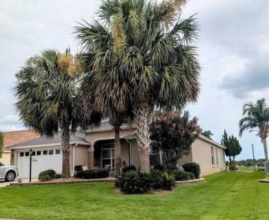 This Custom expanded Gardenia Model has pictuesqes views through on Glenview Championship Golf and Country Club in Florida - for sale on GolfHomes.com, golf home, golf lot