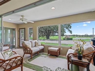 This Custom expanded Gardenia Model has pictuesqes views through on Glenview Championship Golf and Country Club in Florida - for sale on GolfHomes.com, golf home, golf lot