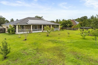 A RARE FIND! Welcome to a rare solar-powered retreat in the on Wedgefield Golf Club in Florida - for sale on GolfHomes.com, golf home, golf lot