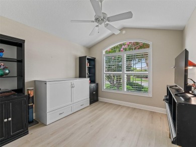 This Custom expanded Gardenia Model has pictuesqes views through on Glenview Championship Golf and Country Club in Florida - for sale on GolfHomes.com, golf home, golf lot