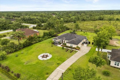 A RARE FIND! Welcome to a rare solar-powered retreat in the on Wedgefield Golf Club in Florida - for sale on GolfHomes.com, golf home, golf lot