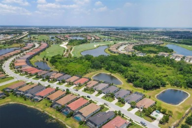 Welcome home to this beautifully decorated, 4 bed, 2 bath on Lakewood National Golf Club in Florida - for sale on GolfHomes.com, golf home, golf lot