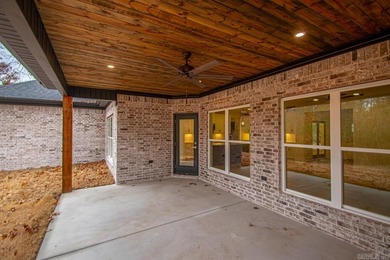 Step inside this beautiful new 4 bed, 2.5 bath home and fall in on Silver Springs Country Club in Arkansas - for sale on GolfHomes.com, golf home, golf lot
