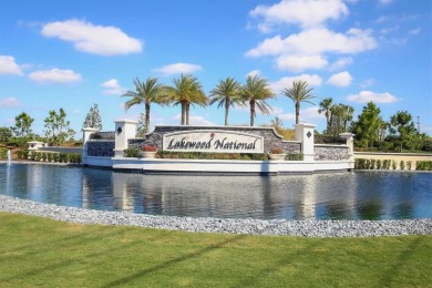 Welcome home to this beautifully decorated, 4 bed, 2 bath on Lakewood National Golf Club in Florida - for sale on GolfHomes.com, golf home, golf lot