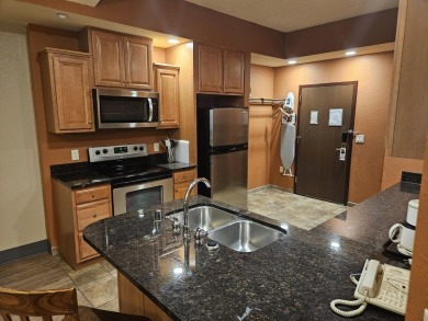 Beautiful 4th floor Condo facing the Wis. River. 2 fireplaces, 3 on Coldwater Canyon Golf Course in Wisconsin - for sale on GolfHomes.com, golf home, golf lot