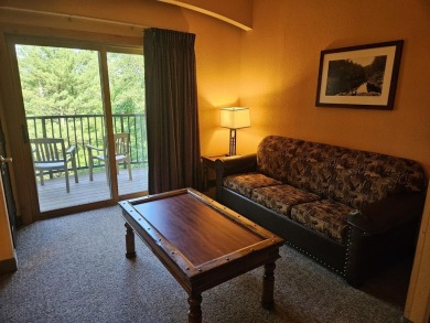 Beautiful 4th floor Condo facing the Wis. River. 2 fireplaces, 3 on Coldwater Canyon Golf Course in Wisconsin - for sale on GolfHomes.com, golf home, golf lot