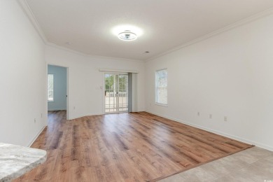 This is a beautifully upgraded end-unit 3-bedroom/2-bathroom on Heron Point Golf Club in South Carolina - for sale on GolfHomes.com, golf home, golf lot