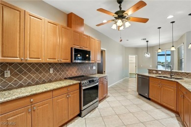 This spacious 4-bedroom + den, 3-bathroom home offers the on Burnt Store Golf Club in Florida - for sale on GolfHomes.com, golf home, golf lot