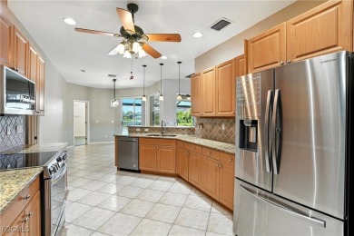 This spacious 4-bedroom + den, 3-bathroom home offers the on Burnt Store Golf Club in Florida - for sale on GolfHomes.com, golf home, golf lot