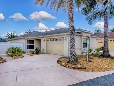 LOCATION is everything with this 2/2 block and stucco Woodlawn on Bacall Executive Golf Course in Florida - for sale on GolfHomes.com, golf home, golf lot