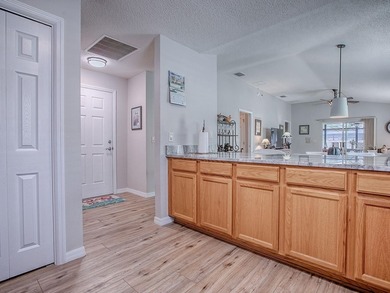 LOCATION is everything with this 2/2 block and stucco Woodlawn on Bacall Executive Golf Course in Florida - for sale on GolfHomes.com, golf home, golf lot
