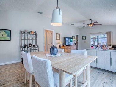 LOCATION is everything with this 2/2 block and stucco Woodlawn on Bacall Executive Golf Course in Florida - for sale on GolfHomes.com, golf home, golf lot