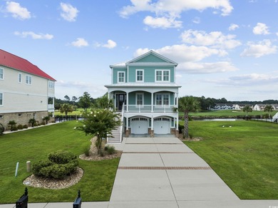 Welcome home to 400 W. Palms Drive, where waterway living is on Myrtlewood Golf Course and Club  in South Carolina - for sale on GolfHomes.com, golf home, golf lot