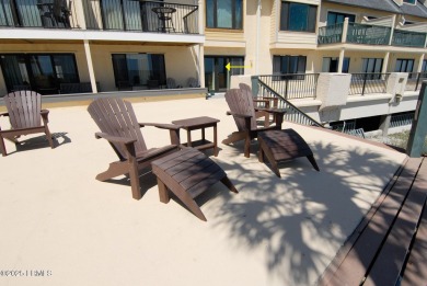 Wake up to breathtaking sunrises and watch dolphins, sea turtles on Ocean Point Golf Links in South Carolina - for sale on GolfHomes.com, golf home, golf lot