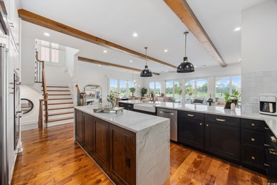 Welcome home to 400 W. Palms Drive, where waterway living is on Myrtlewood Golf Course and Club  in South Carolina - for sale on GolfHomes.com, golf home, golf lot