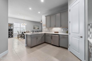 Stunning Maintenance-Free Townhome in Gated Plantation Bay on Plantation Bay Golf and Country Club in Florida - for sale on GolfHomes.com, golf home, golf lot