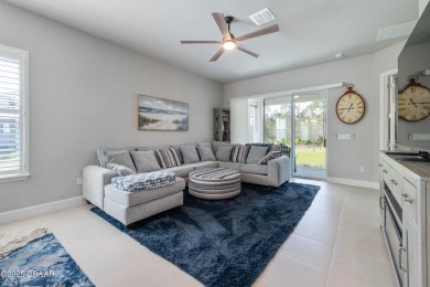 Stunning Maintenance-Free Townhome in Gated Plantation Bay on Plantation Bay Golf and Country Club in Florida - for sale on GolfHomes.com, golf home, golf lot