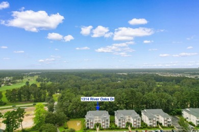 This isn't just a home, it's a lifestyle waiting for you in The on River Oaks Golf Plantation  in South Carolina - for sale on GolfHomes.com, golf home, golf lot