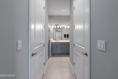 Stunning Maintenance-Free Townhome in Gated Plantation Bay on Plantation Bay Golf and Country Club in Florida - for sale on GolfHomes.com, golf home, golf lot