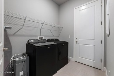 Stunning Maintenance-Free Townhome in Gated Plantation Bay on Plantation Bay Golf and Country Club in Florida - for sale on GolfHomes.com, golf home, golf lot