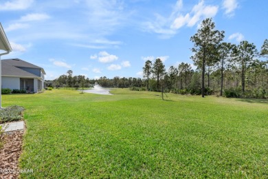 Stunning Maintenance-Free Townhome in Gated Plantation Bay on Plantation Bay Golf and Country Club in Florida - for sale on GolfHomes.com, golf home, golf lot