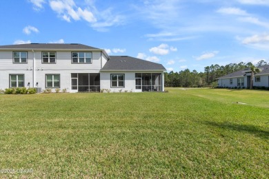 Stunning Maintenance-Free Townhome in Gated Plantation Bay on Plantation Bay Golf and Country Club in Florida - for sale on GolfHomes.com, golf home, golf lot