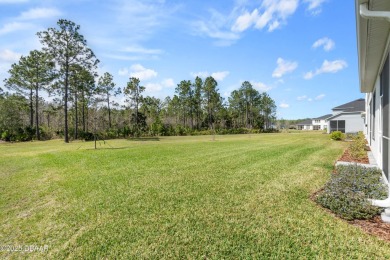 Stunning Maintenance-Free Townhome in Gated Plantation Bay on Plantation Bay Golf and Country Club in Florida - for sale on GolfHomes.com, golf home, golf lot
