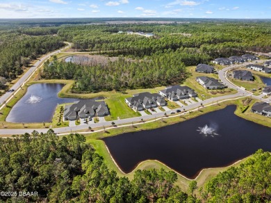 Stunning Maintenance-Free Townhome in Gated Plantation Bay on Plantation Bay Golf and Country Club in Florida - for sale on GolfHomes.com, golf home, golf lot