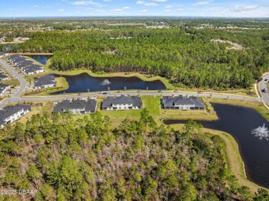 Stunning Maintenance-Free Townhome in Gated Plantation Bay on Plantation Bay Golf and Country Club in Florida - for sale on GolfHomes.com, golf home, golf lot