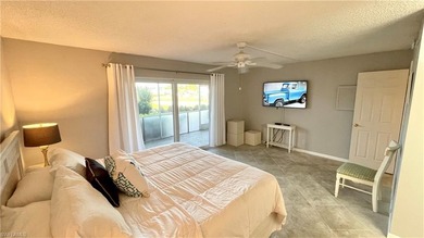This amazing first floor condominium is a must see! It features on The Glades Golf and Country Club in Florida - for sale on GolfHomes.com, golf home, golf lot