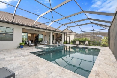 Step into a serene oasis where luxury meets leisure--an on Lakewood National Golf Club in Florida - for sale on GolfHomes.com, golf home, golf lot