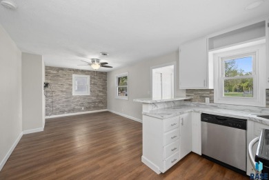 Cute as a button! This quaint one-level home is sure to impress on Elmwood Park Golf Course in South Dakota - for sale on GolfHomes.com, golf home, golf lot