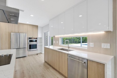 Welcome to this fully reimagined South Florida masterpiece! This on Lakeview Golf Club in Florida - for sale on GolfHomes.com, golf home, golf lot